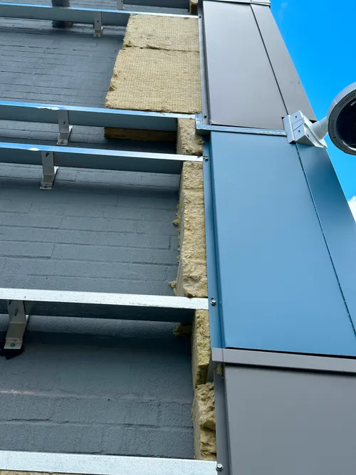 tch re-recladding on a building