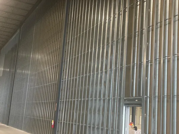 interior of a commercial building highlighting a fire-rated wall separation