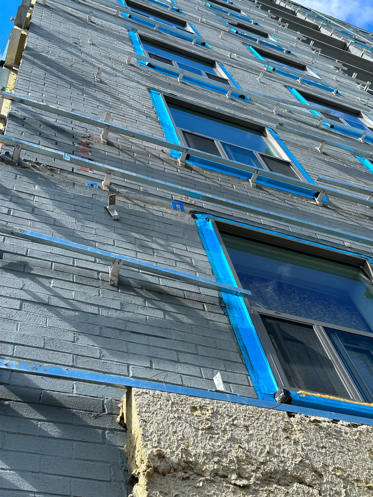 tch re-cladding on a building