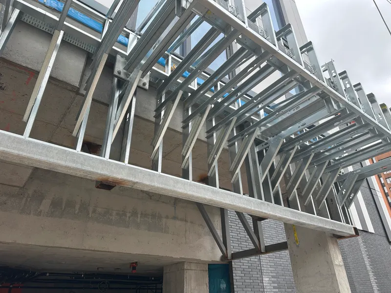 residential building with exterior soffit at canopy