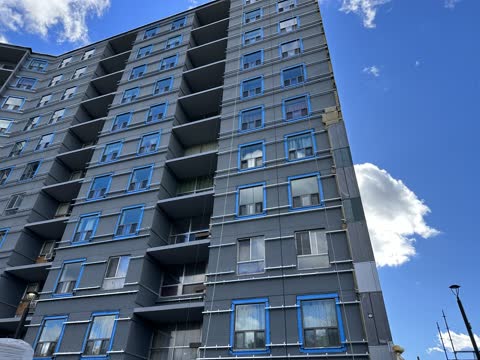 Building renovation with envelope recladding